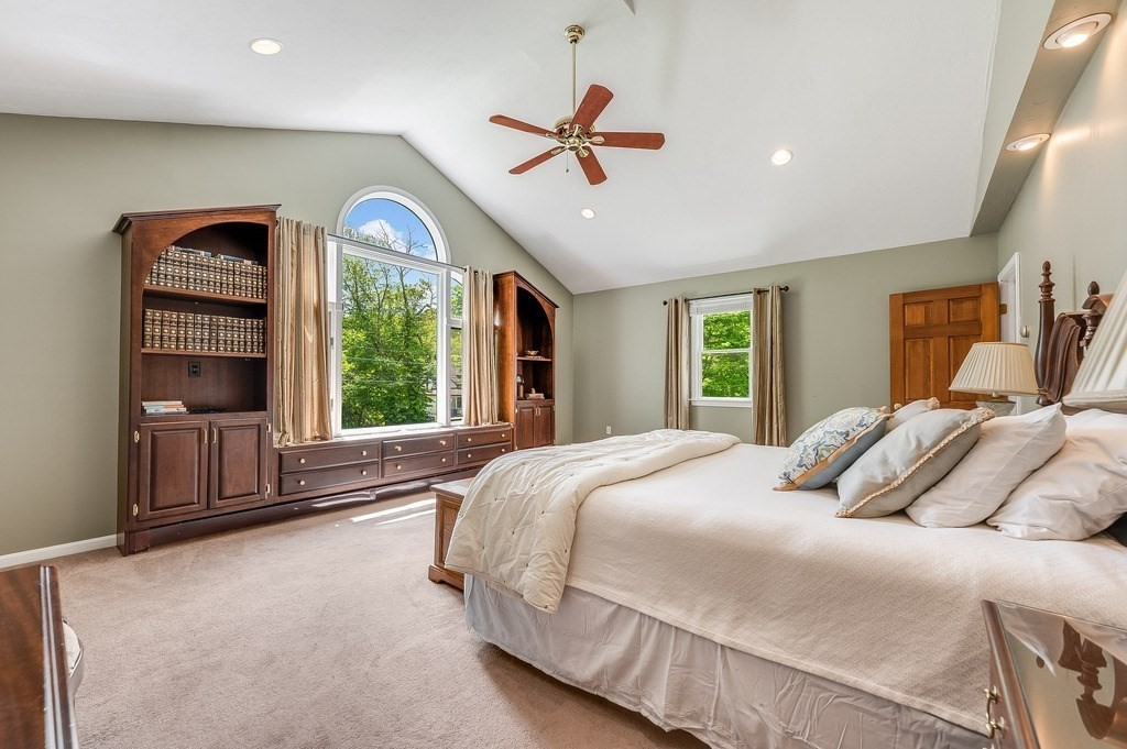 2470 West Street Wrentham, MA 02093 - Photo 30 of 42 a bedroom with a large bed and a large window