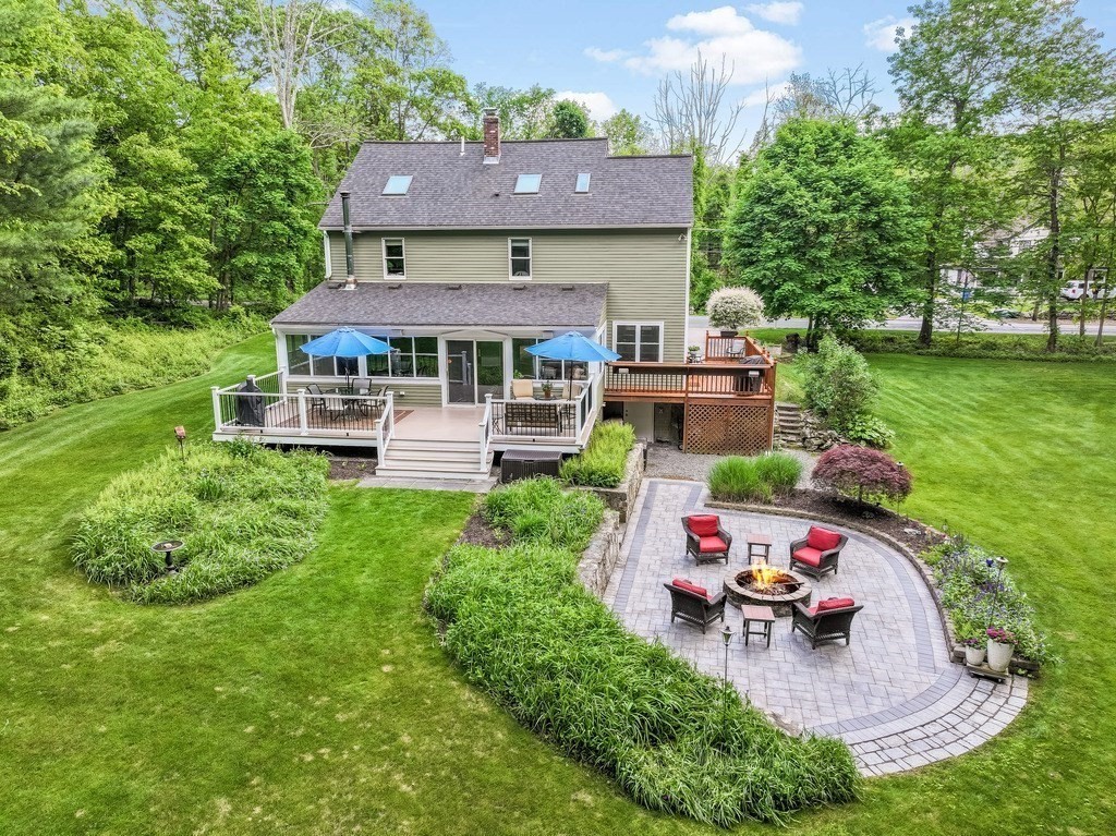 2470 West Street Wrentham, MA 02093 - Photo 36 of 42 aerial view of a house with a yard patio and fire pit
