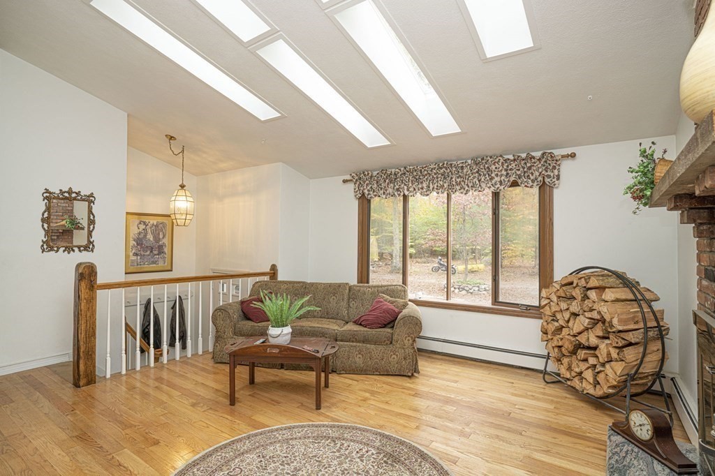 54 Gorham Street Rehoboth, MA 02769 - Photo 11 of 40 a living room with furniture and a large window
