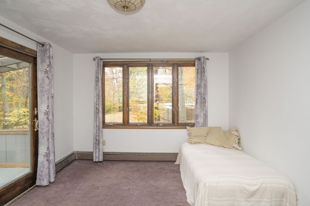 54 Gorham Street Rehoboth, MA 02769 - Photo 15 of 40 a bedroom with a bed and a window