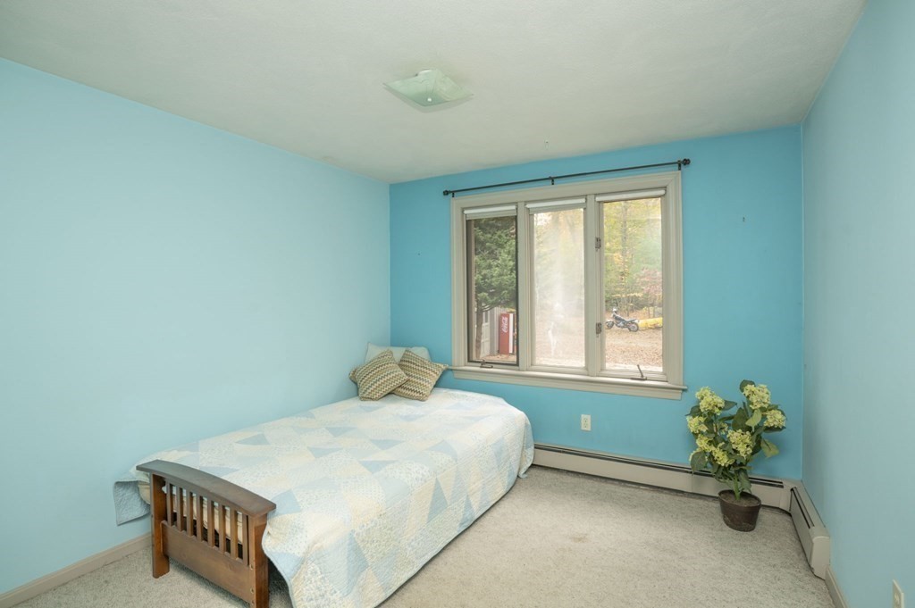 54 Gorham Street Rehoboth, MA 02769 - Photo 18 of 40 a bedroom with a bed and a window