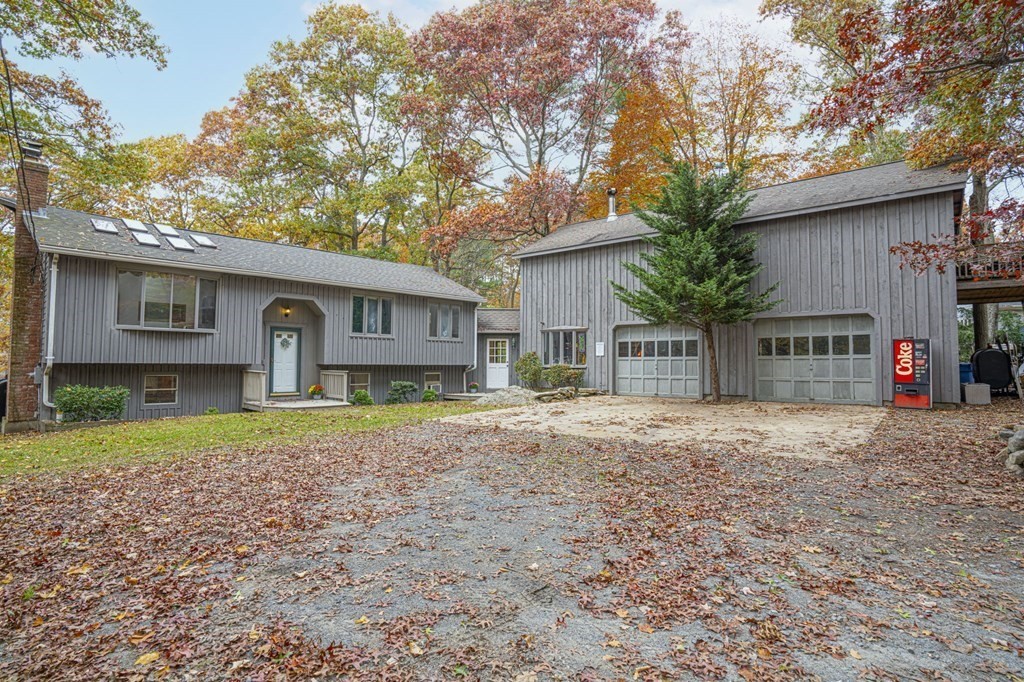 54 Gorham Street Rehoboth, MA 02769 - Photo 2 of 40 a front view of a house with a yard and trees