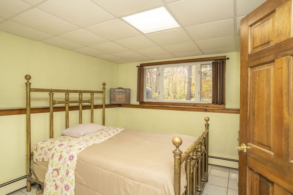 54 Gorham Street Rehoboth, MA 02769 - Photo 21 of 40 a bedroom with a bed and a window