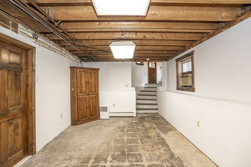 54 Gorham Street Rehoboth, MA 02769 - Photo 27 of 40 a view of a hallway with wooden floor and a hallway