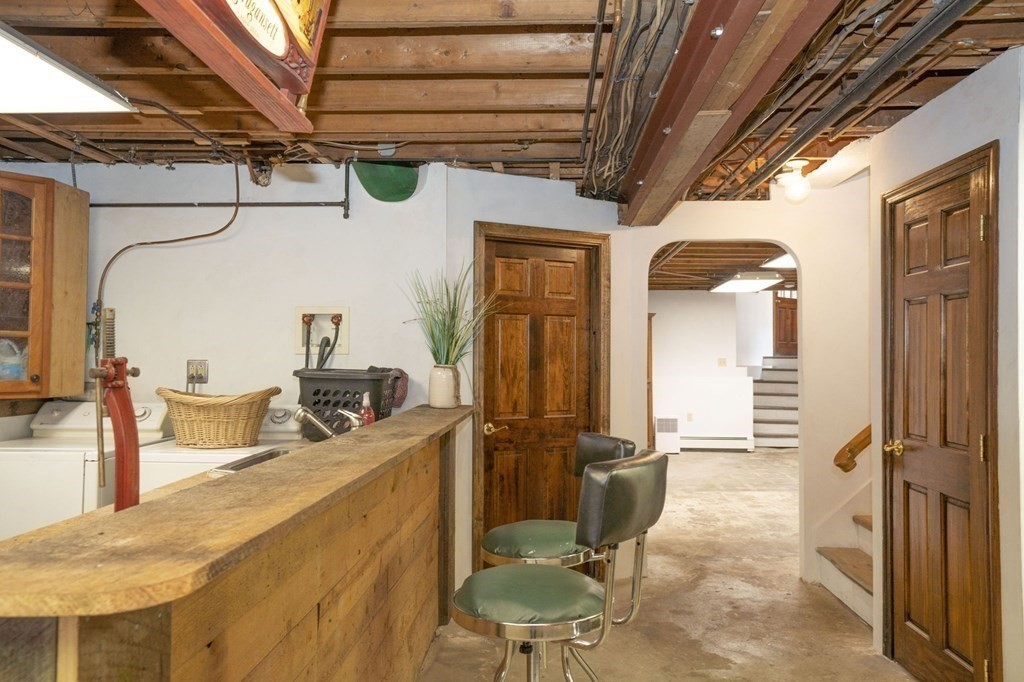 54 Gorham Street Rehoboth, MA 02769 - Photo 29 of 40 a bathroom with a sink a mirror and a shower