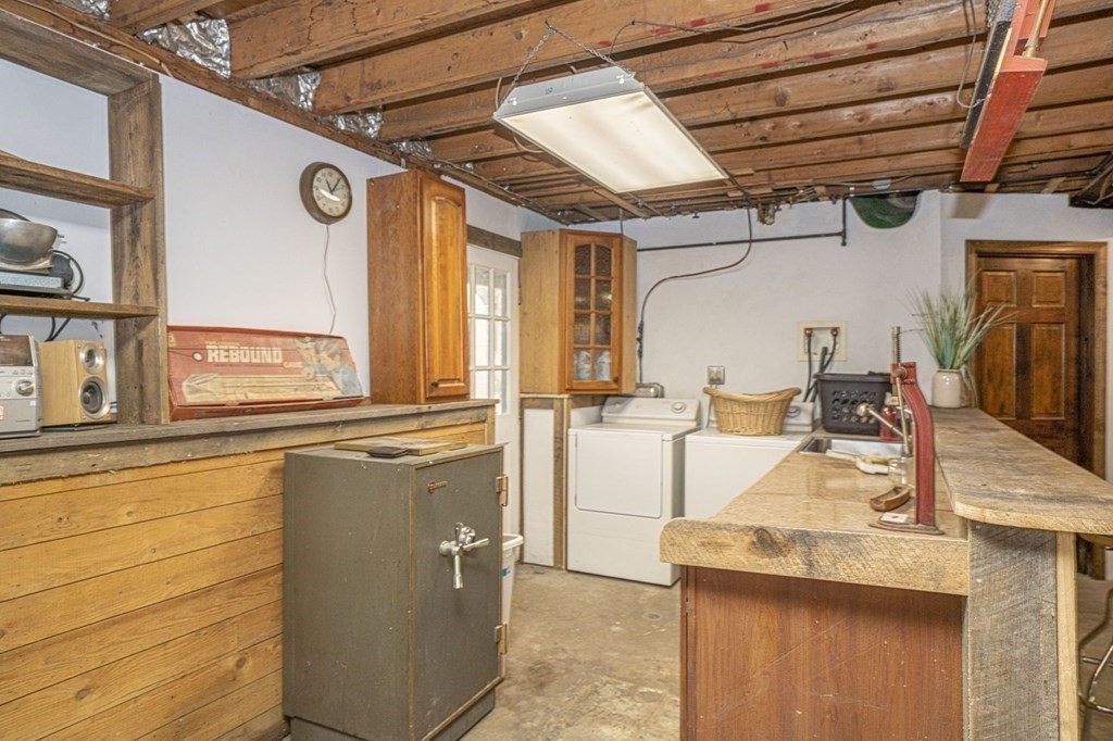 54 Gorham Street Rehoboth, MA 02769 - Photo 32 of 40 a view of a kitchen with a sink and cabinets