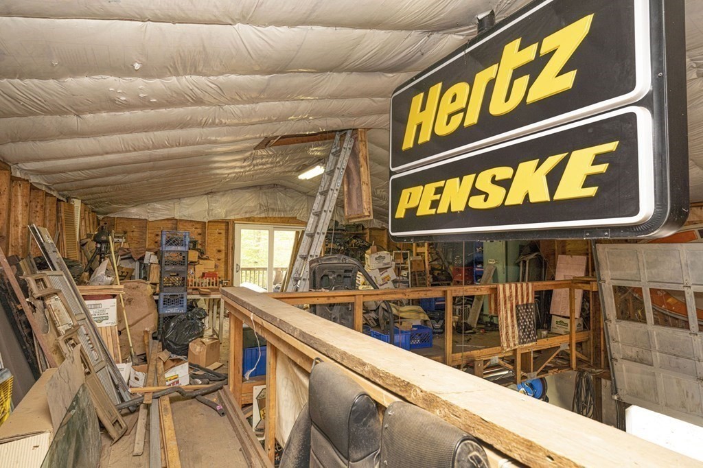 54 Gorham Street Rehoboth, MA 02769 - Photo 33 of 40 a view of a retail shop with a lot of signs