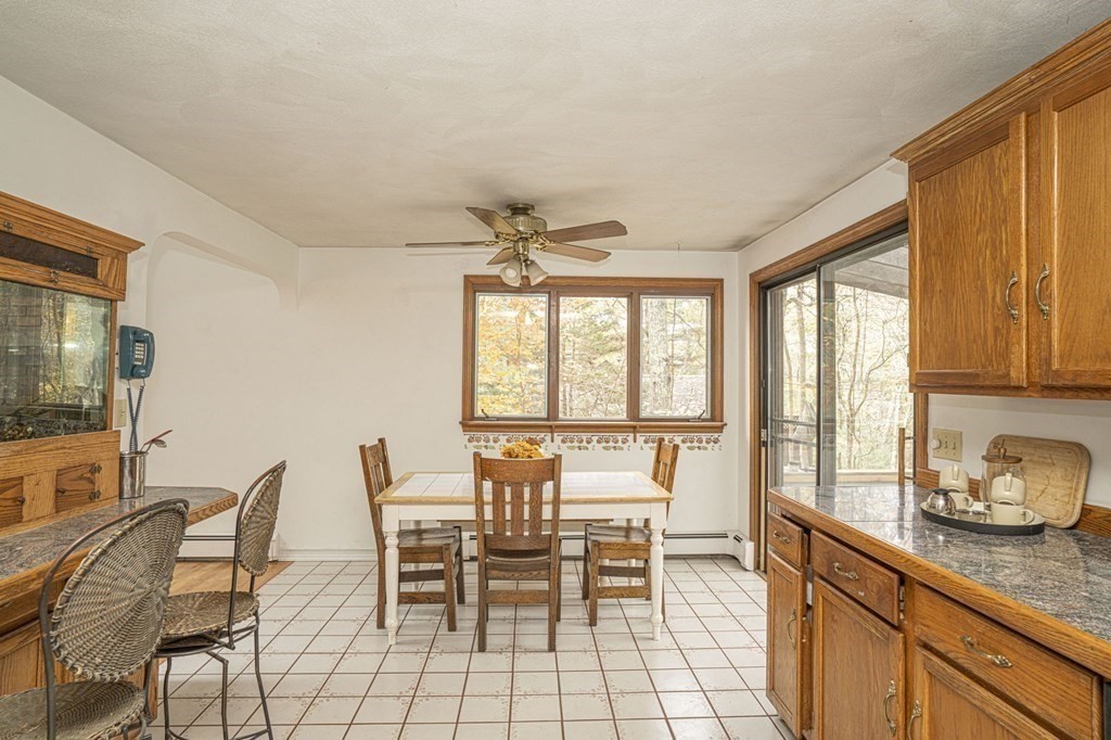 54 Gorham Street Rehoboth, MA 02769 - Photo 8 of 40 a dining room with furniture and large windows