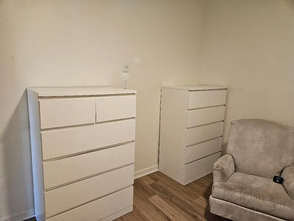 a utility room with storage and racks