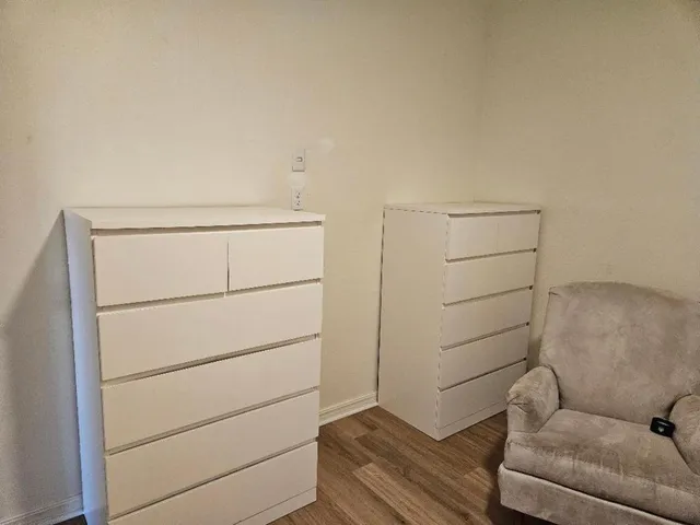 a utility room with storage and racks