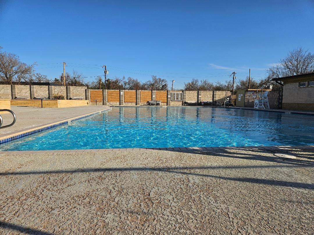 710 North Avenue C Elgin, TX 78621 - Photo 32 of 32 City pool in park behind almost next to the subject property