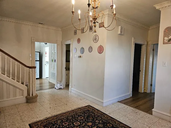 a view of a hallway view with staircase