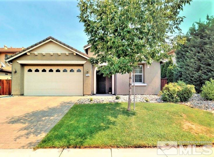 11200 Messina Way Reno, NV 89521 - Photo 1 of 19 a backyard of a house with yard and garage