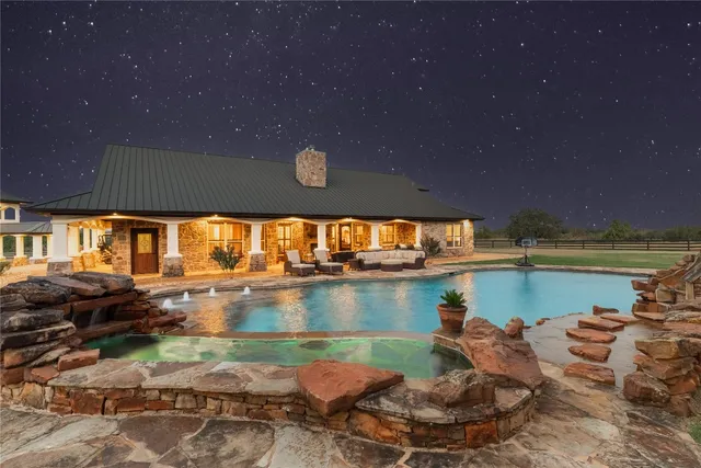 a view of a lake with outdoor seating