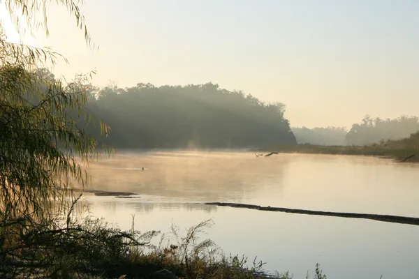 a view of a lake and mountain in the back
