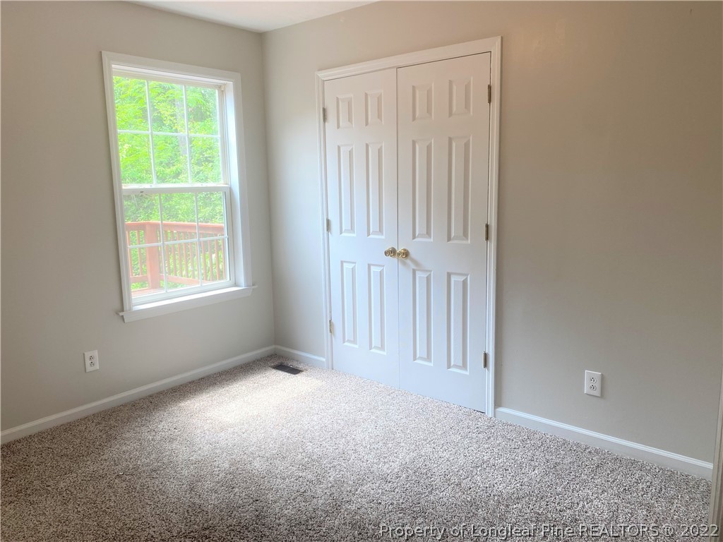 1298 Roundabout Road Cameron, NC 28326 - Photo 18 of 29 an empty room with windows