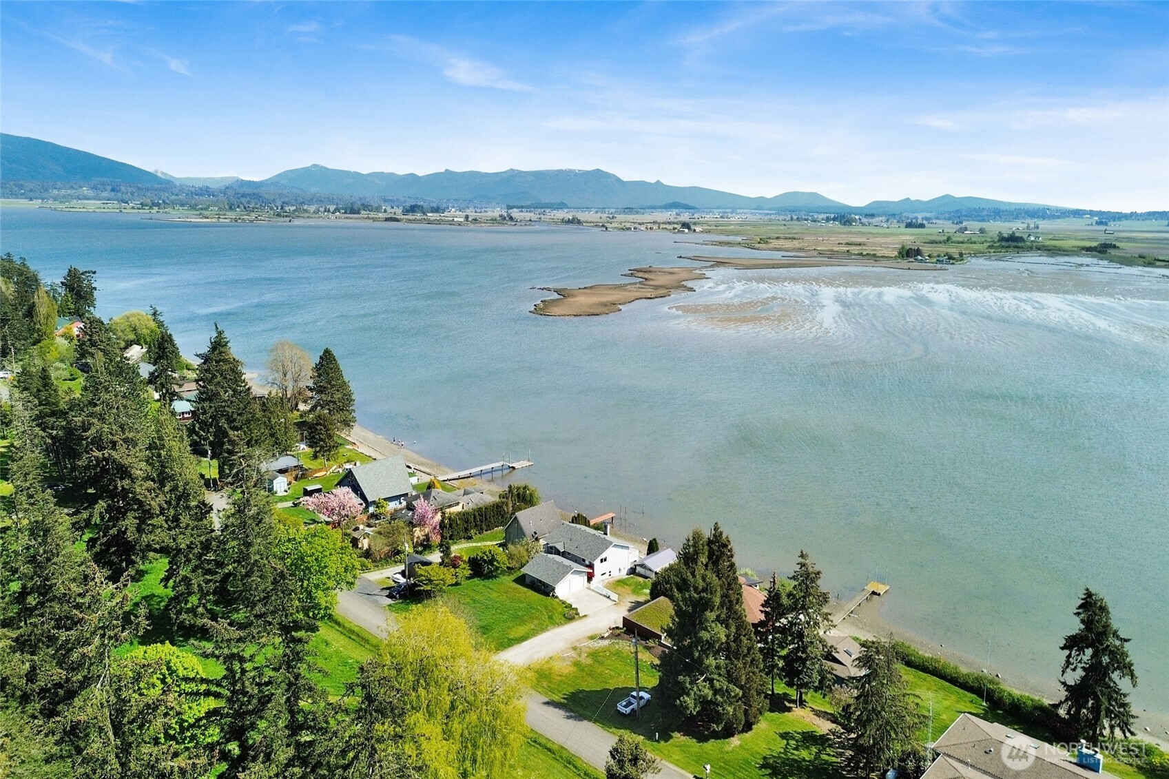 11586 Scott Road Bow, WA 98232 - Photo 2 of 28 a view of a lake with a mountain