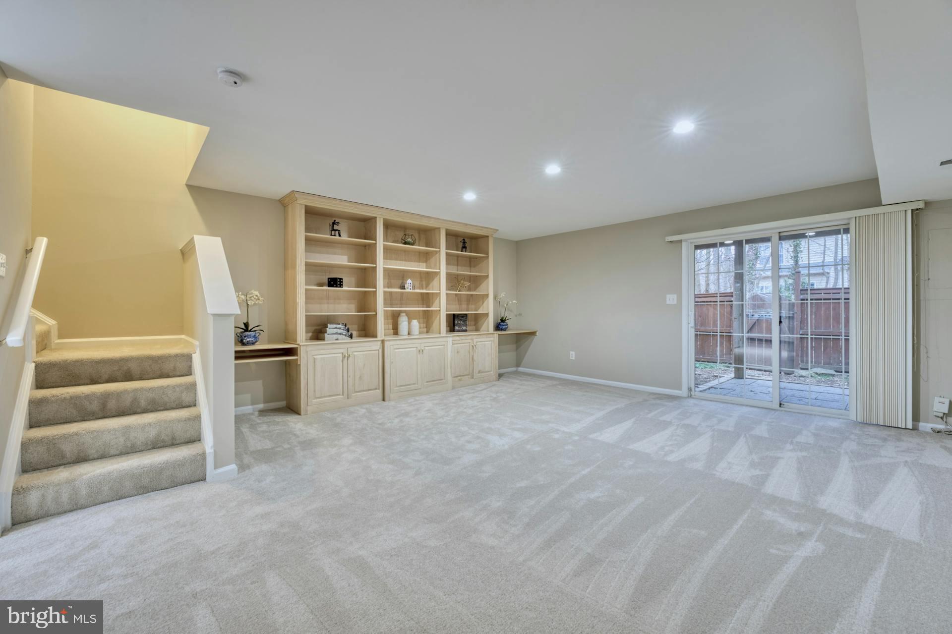 11485 Heritage Commons Way Reston, VA 20194 - Photo 27 of 36 Family Room with built in shelves and new carpet