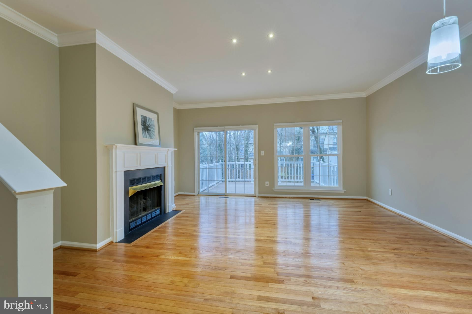 11485 Heritage Commons Way Reston, VA 20194 - Photo 9 of 36 Refinished Hardwood Floors On main floor