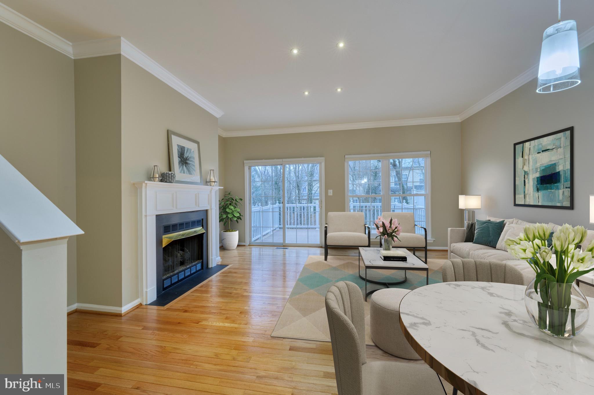 11485 Heritage Commons Way Reston, VA 20194 - Photo 10 of 36 Virtually staged Living Room/Dining Room