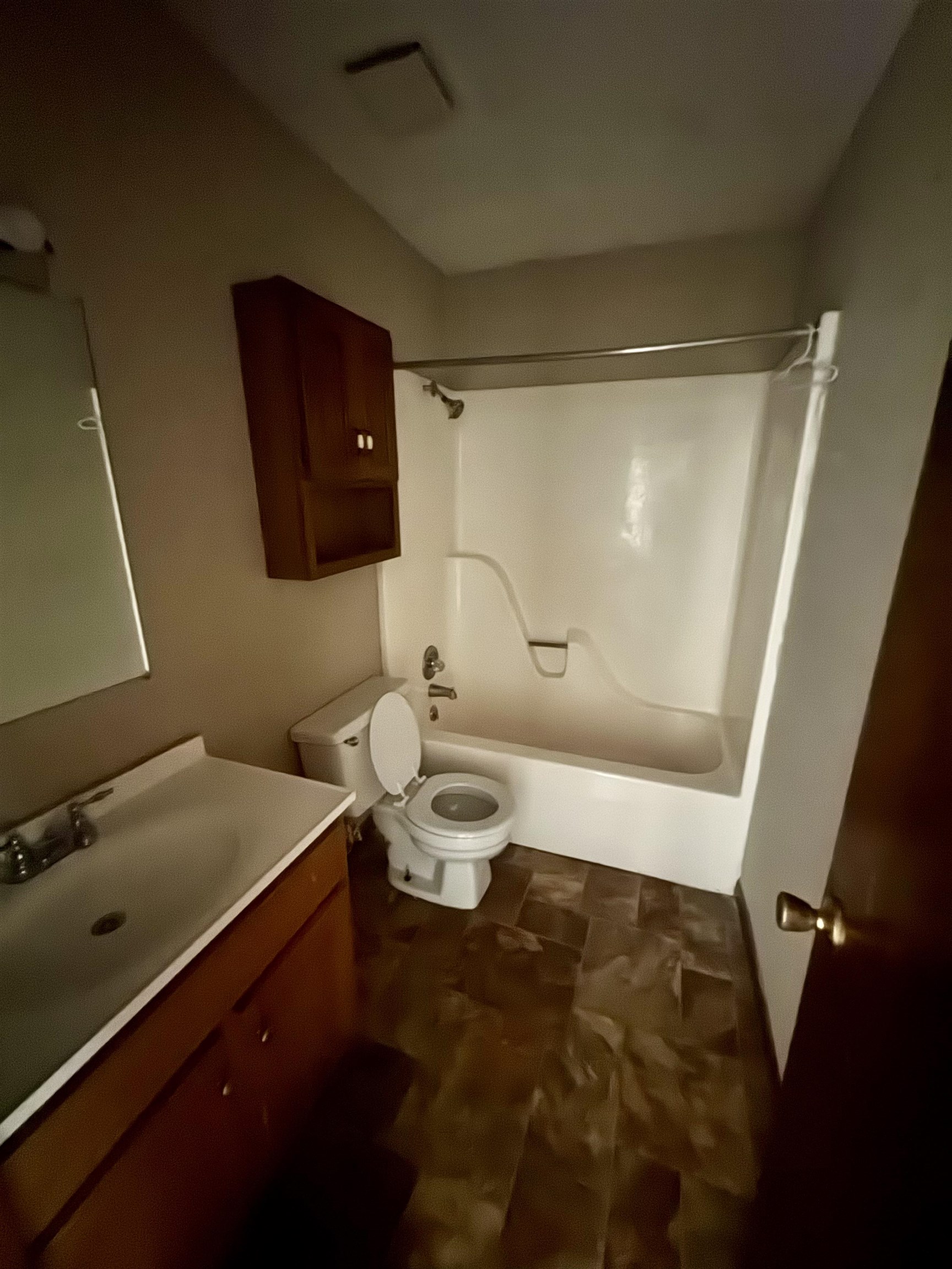 112 Halliburton Street Ripley, TN 38063 - Photo 4 of 5 a bathroom with a sink and a mirror