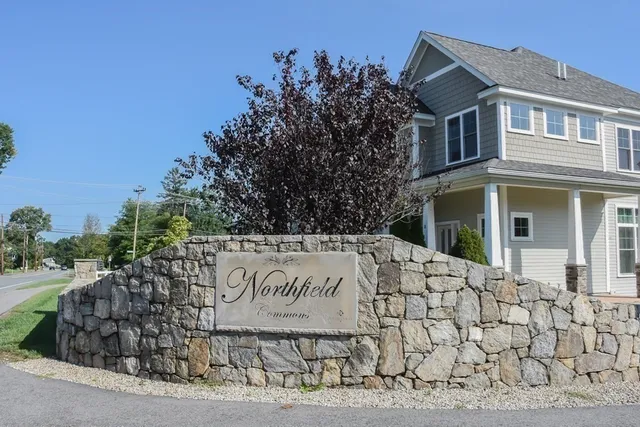 a sign on the side of a building