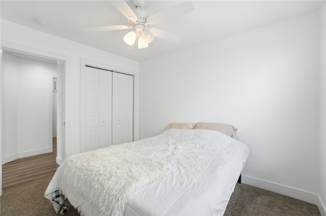 728 East Northern Avenue Springfield, OH 45503 - Photo 24 of 35 This bright bedroom features a ceiling fan, plush carpeting, and a spacious closet.