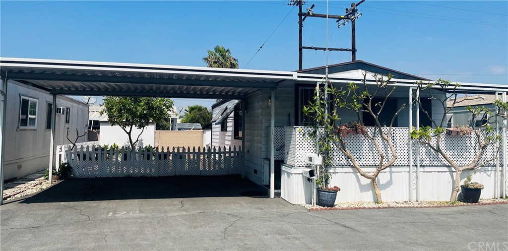 16601 Garfield Avenue, Unit 128 Paramount, CA 90723 - Photo 1 of 32 a view of a balcony