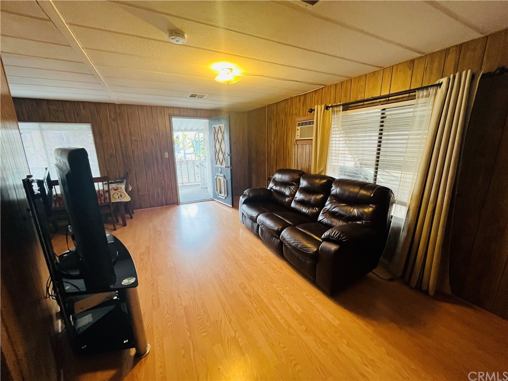 16601 Garfield Avenue, Unit 128 Paramount, CA 90723 - Photo 11 of 32 a living room with furniture