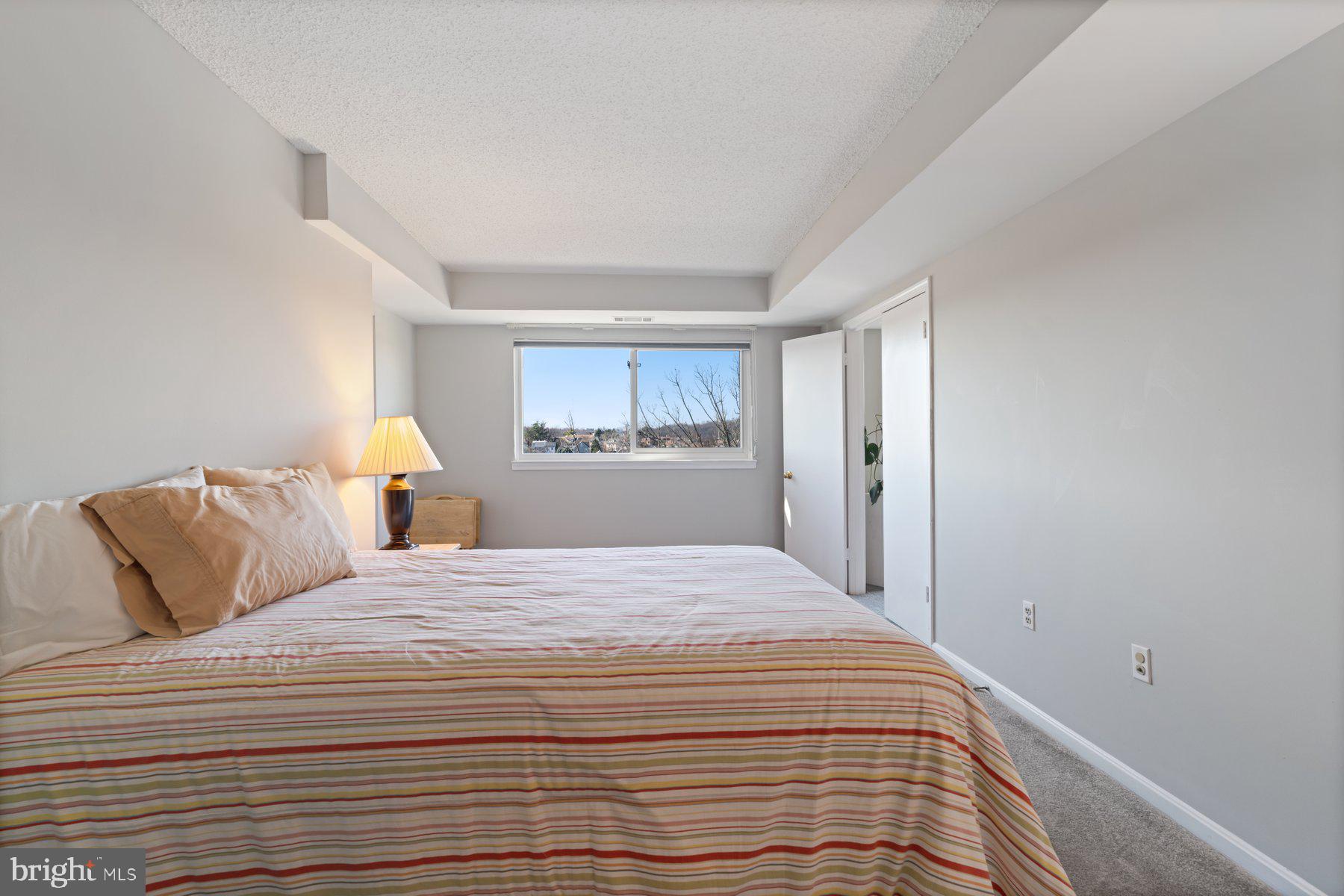 1040 Deer Ridge Drive, Unit 402 Baltimore, MD 21210 - Photo 17 of 34 Large window for great light and balcony access