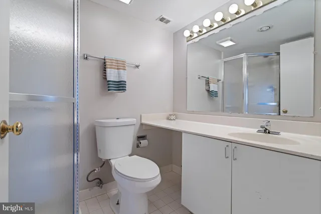 a view of a chairs and table in the balcony