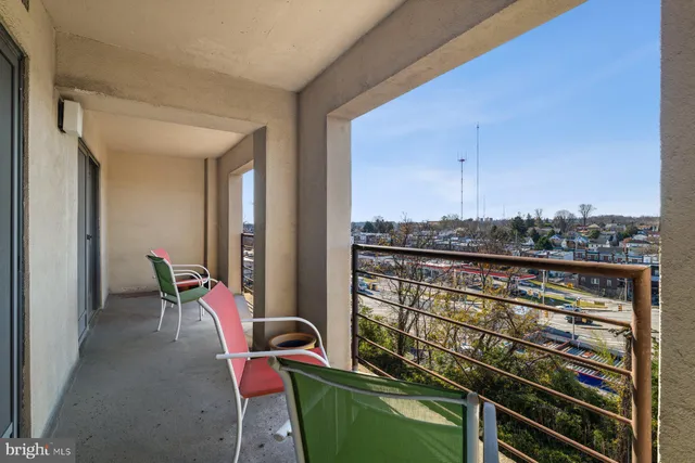 a view of balcony with furniture