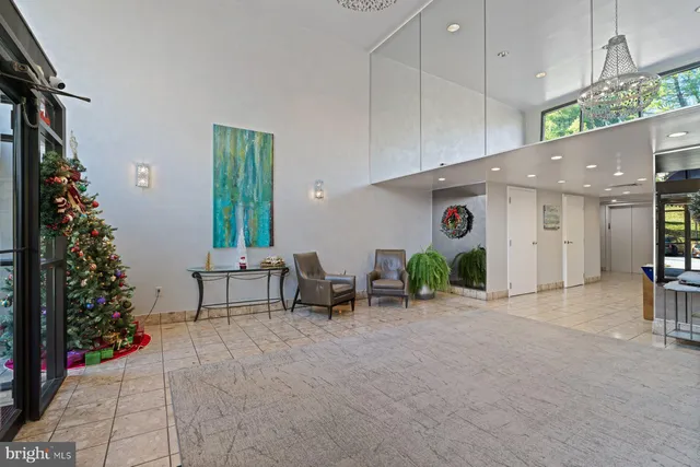 a view of a street with a building in the background