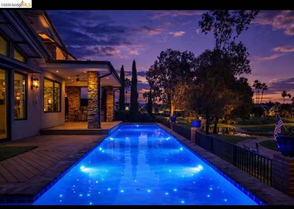 a view of outdoor space with wooden floor and city view