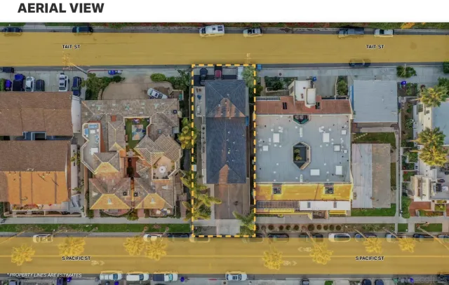 a view of a swimming pool with outdoor seating