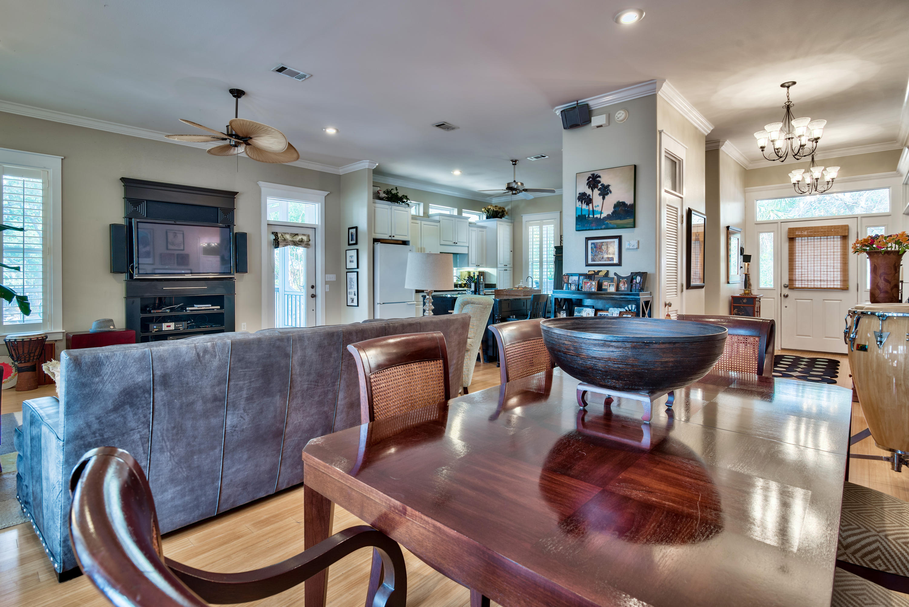 458 Bayou Circle Freeport, FL 32439 - Photo 13 of 33 a living room with furniture a flat screen tv and a fireplace