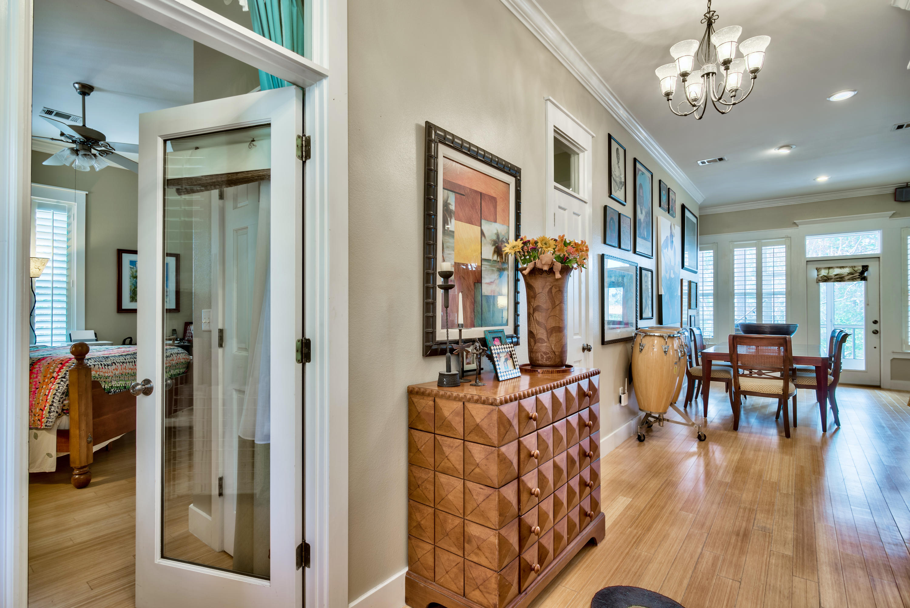 458 Bayou Circle Freeport, FL 32439 - Photo 23 of 33 a view of a livingroom with furniture wooden floor and a chandelier