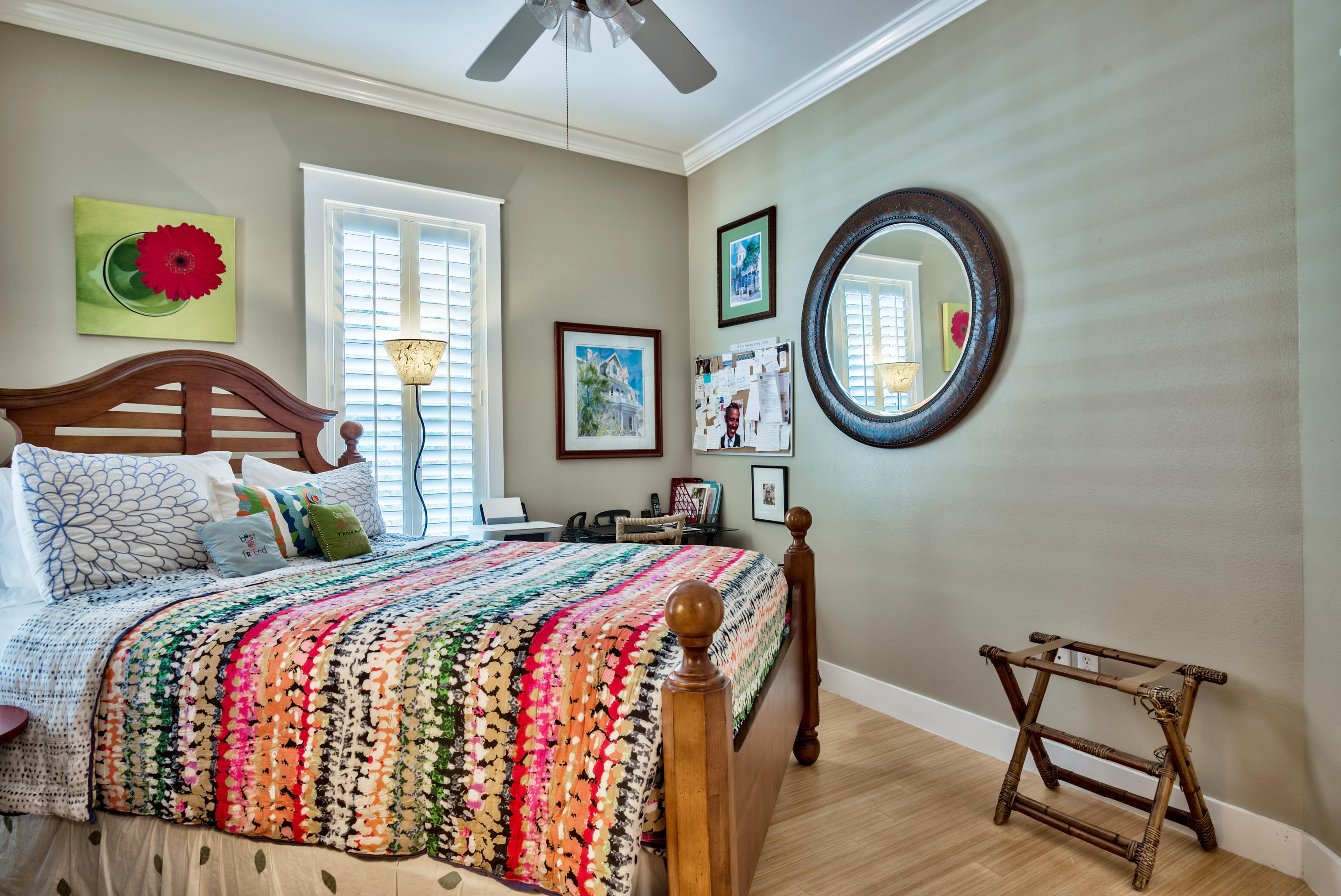 458 Bayou Circle Freeport, FL 32439 - Photo 24 of 33 a bedroom with a bed and a chandelier