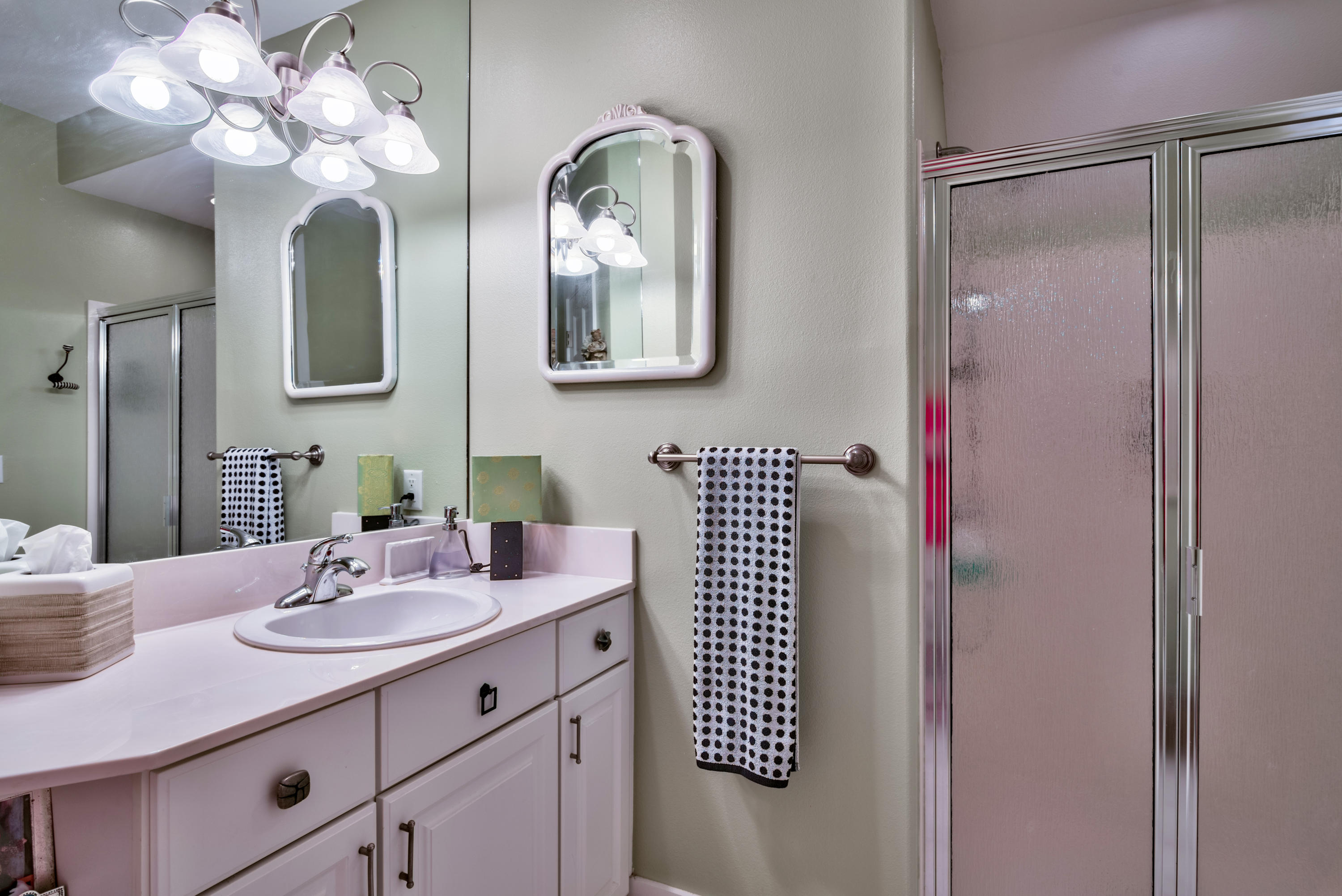 458 Bayou Circle Freeport, FL 32439 - Photo 25 of 33 a bathroom with a sink and a mirror