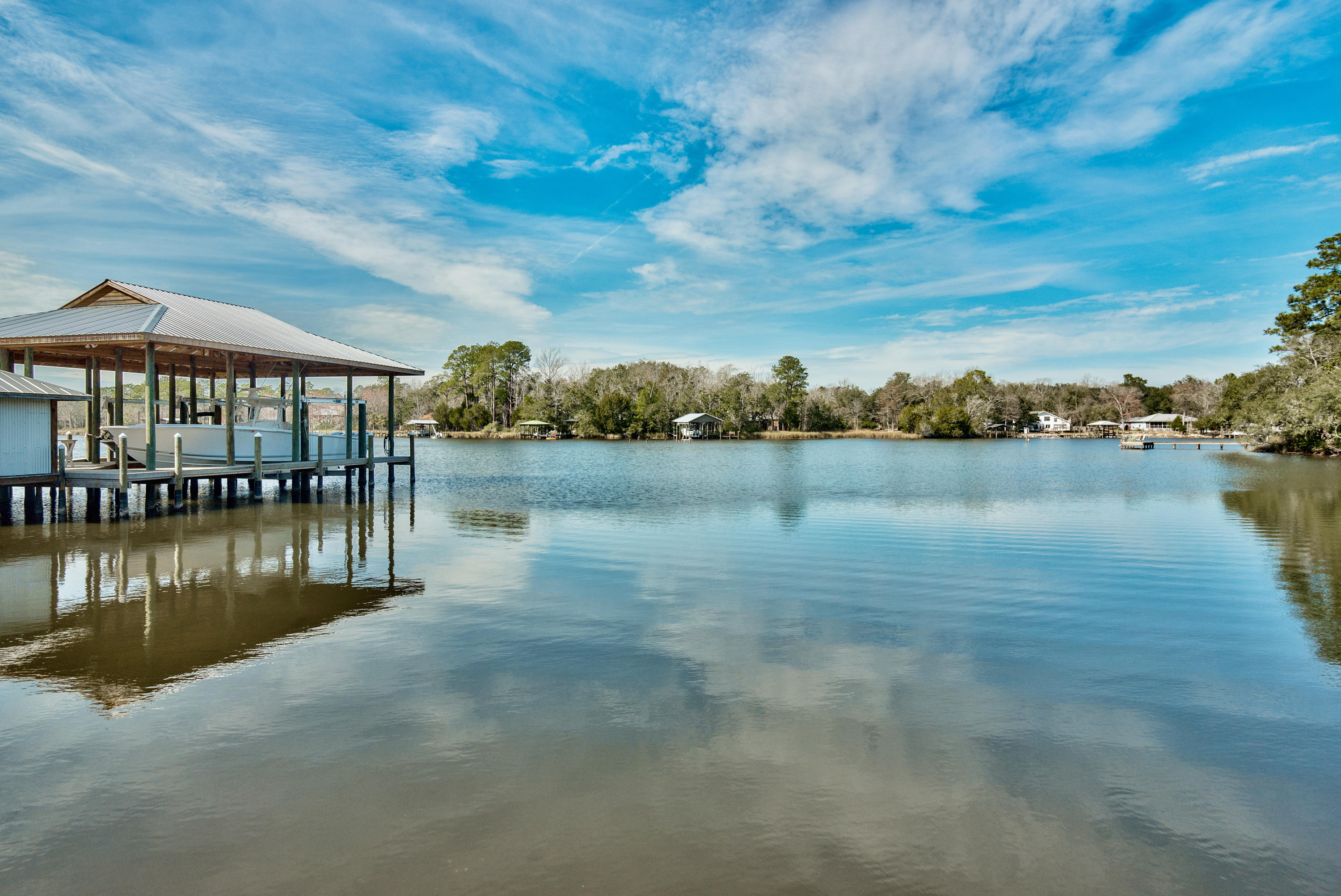 458 Bayou Circle Freeport, FL 32439 - Photo 7 of 33 a view of a lake with houses in the back