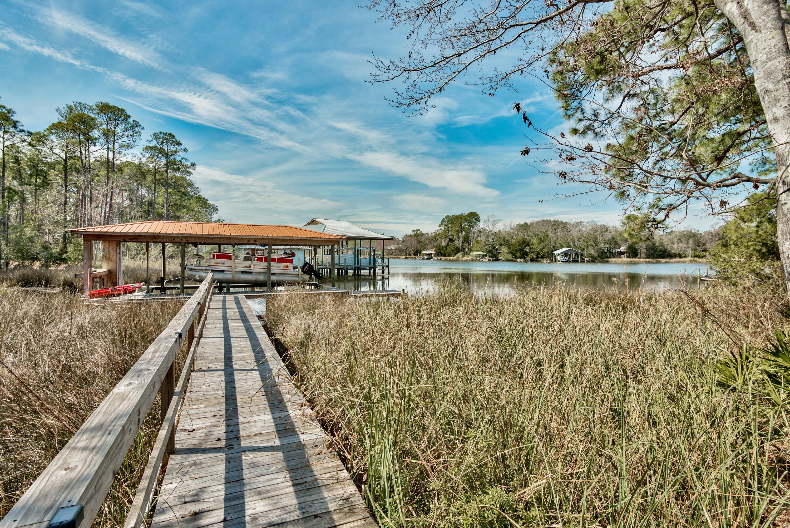 458 Bayou Circle Freeport, FL 32439 - Photo 8 of 33 a view of swimming pool with a lake view