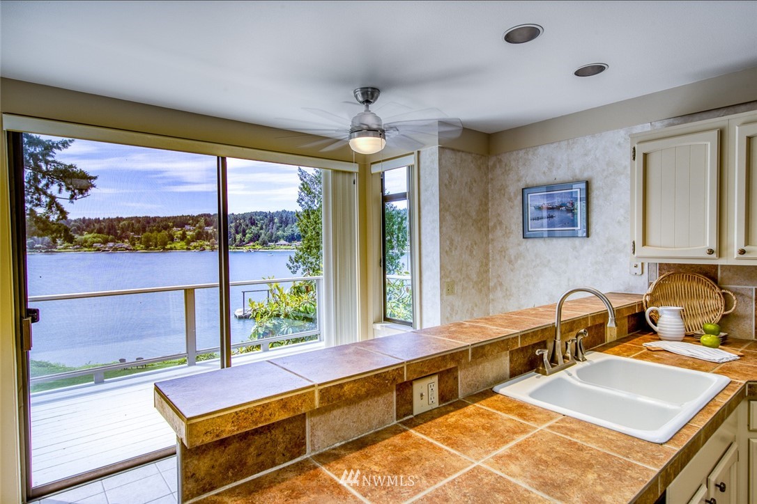 21005 Indianola Road Northeast Poulsbo, WA 98370 - Photo 11 of 40 a room with pool table and windows