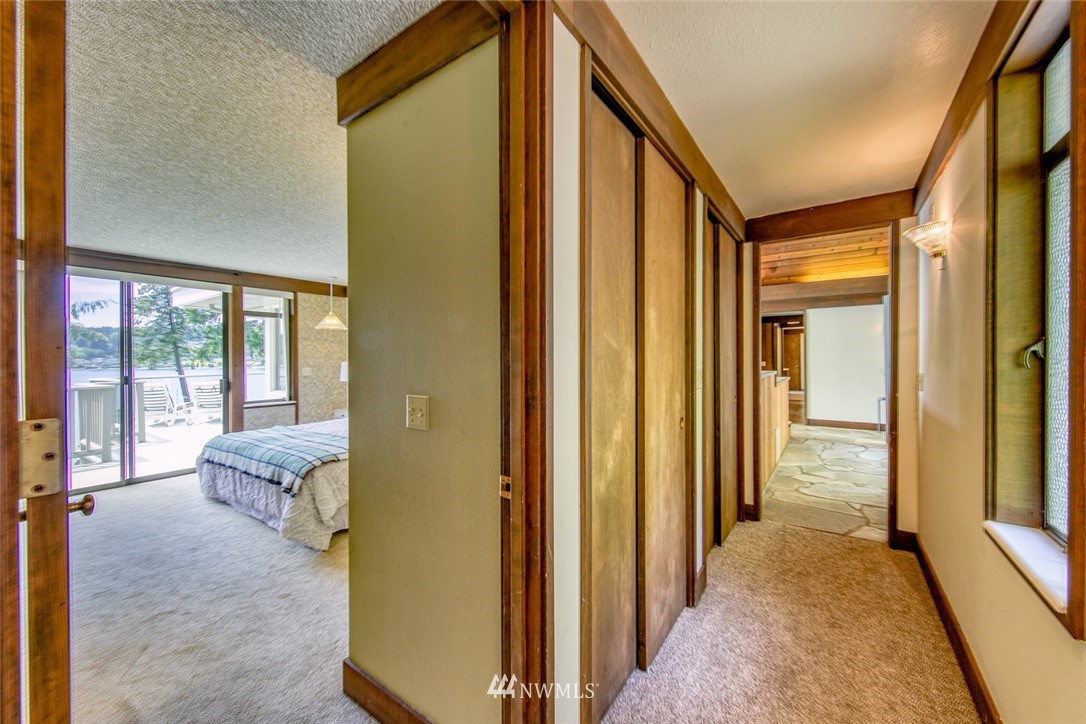 21005 Indianola Road Northeast Poulsbo, WA 98370 - Photo 16 of 40 a view of hallway with furniture