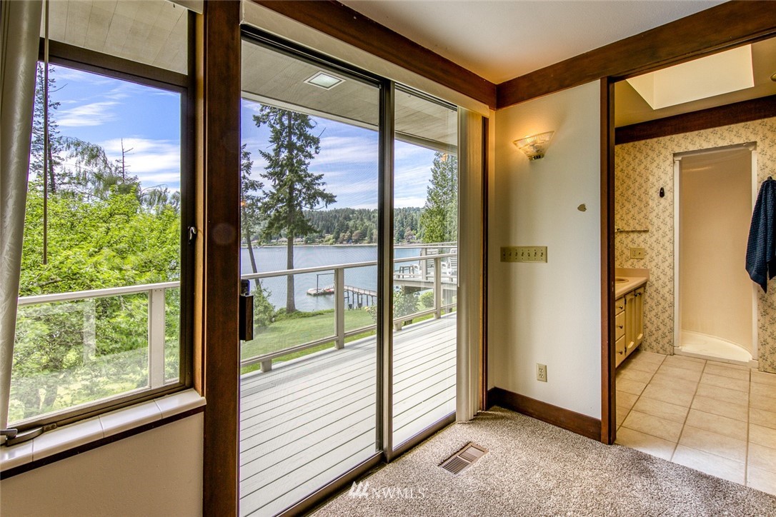 21005 Indianola Road Northeast Poulsbo, WA 98370 - Photo 22 of 40 a view of a room that has a large window