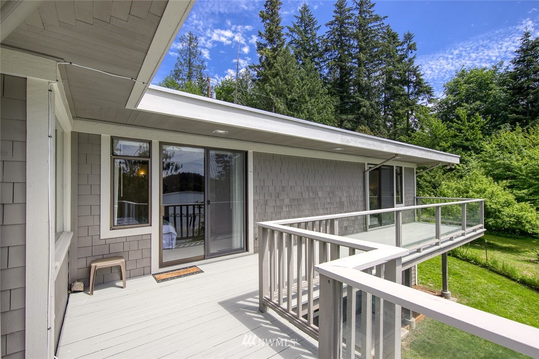 21005 Indianola Road Northeast Poulsbo, WA 98370 - Photo 24 of 40 a view of house with outdoor seating