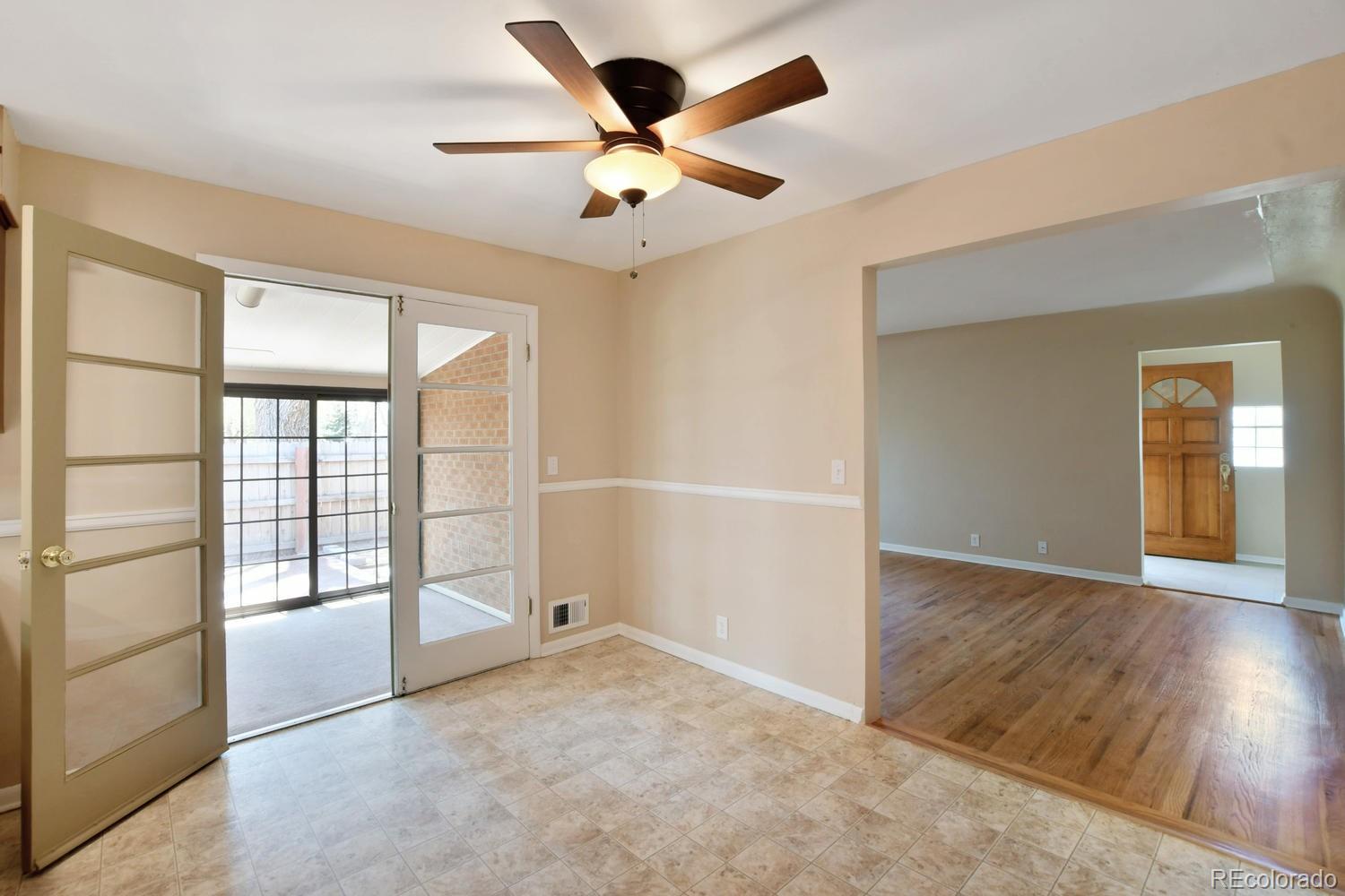 4660 Quay Street Wheat Ridge, CO 80033 - Photo 14 of 37 wooden floor in an empty room with a window