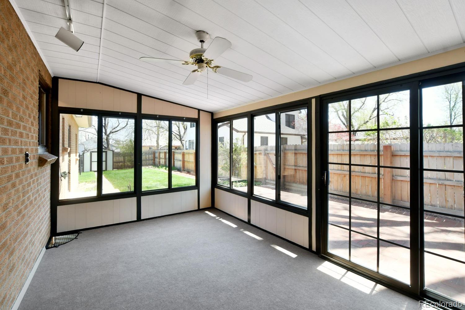 4660 Quay Street Wheat Ridge, CO 80033 - Photo 15 of 37 a view of an empty room with a balcony