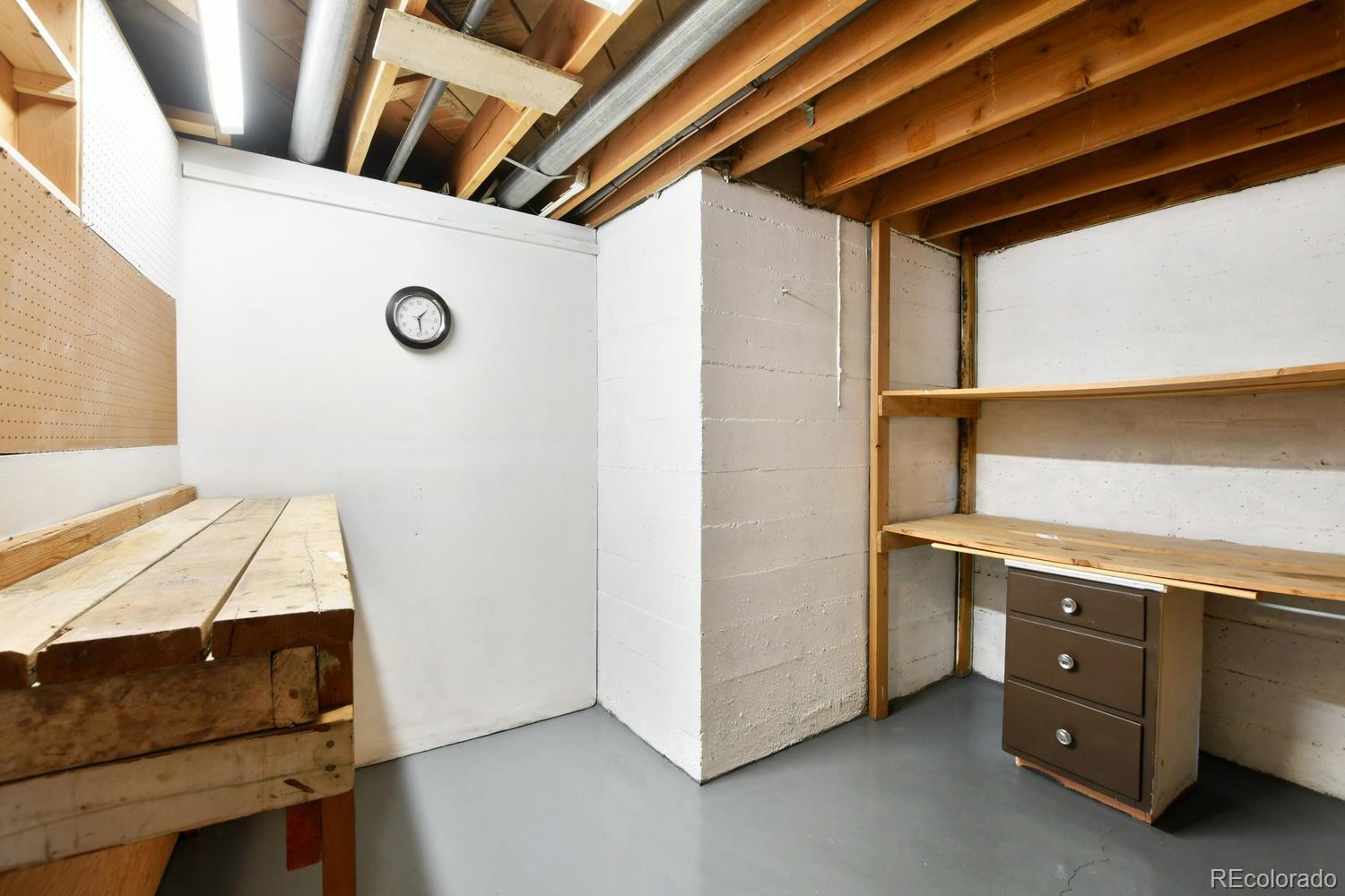 4660 Quay Street Wheat Ridge, CO 80033 - Photo 31 of 37 a view of storage and utility room