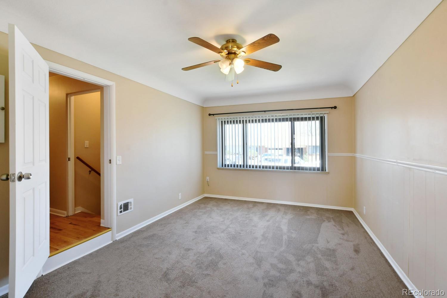 4660 Quay Street Wheat Ridge, CO 80033 - Photo 7 of 37 a view of an empty room with a window