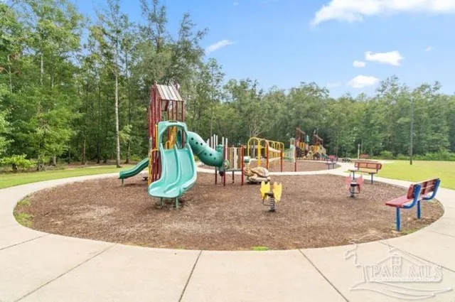 a view of a park with swings
